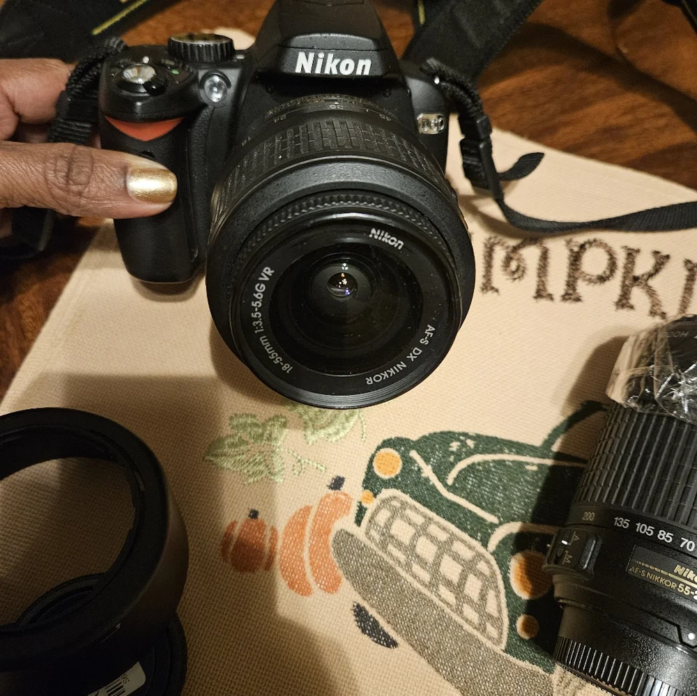 Excellent condition Nikon D60 with two lenses and one new!